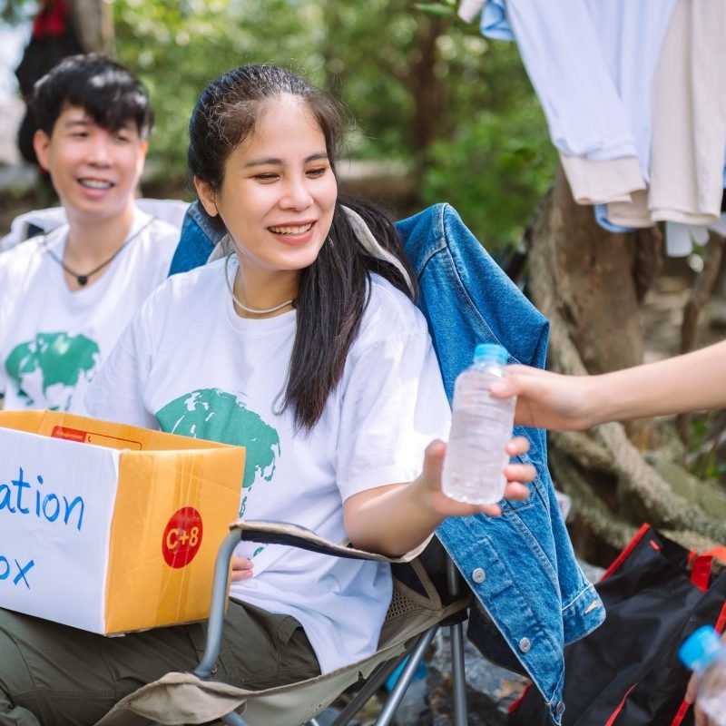 group-of-asian-diverse-people-volunteer-holding-a-donation-box-for-fundraiser-to-emergency-situation.jpg